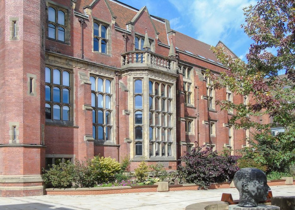 Newcastle University's Armstrong building. Architectural Bronze Casements made shaped double-glazed bronze windows to fit the stone surrounds.