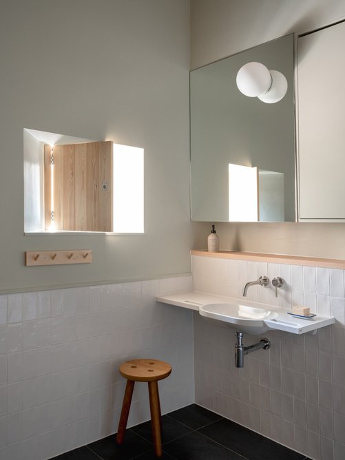 Careful specification made attractive but fully accessible bathrooms.