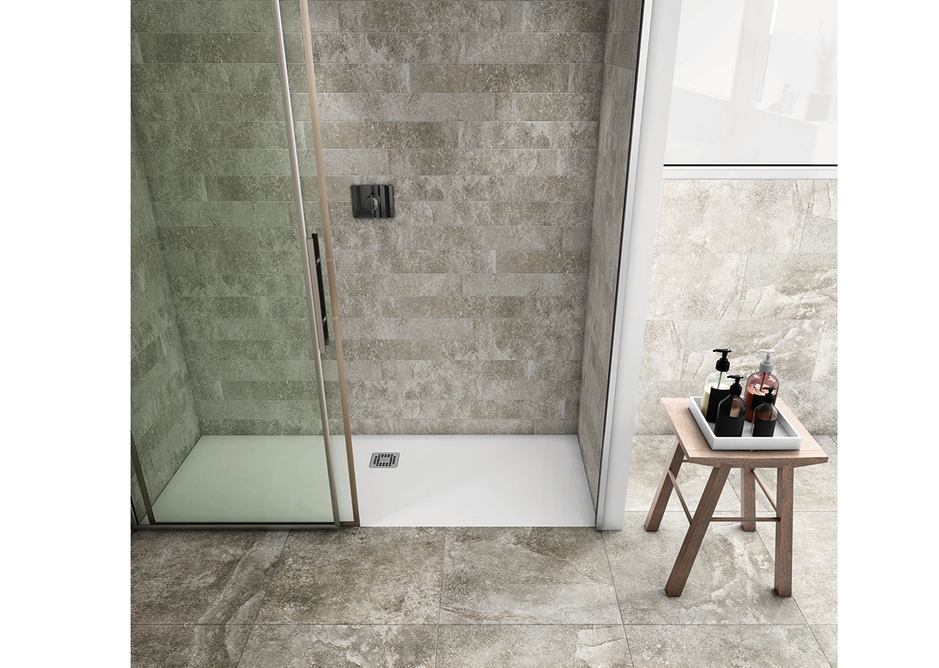 Elegant RAK-Feeling matt finish shower trays are tactile and provide enhanced anti-slip safety. Stone-effect tiles give a distinctive feel to the shower area.