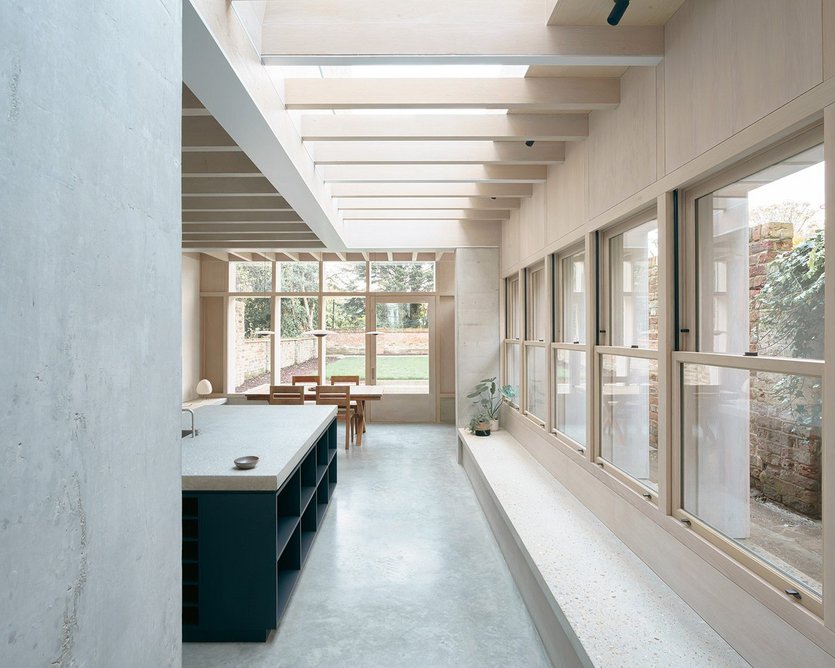 Concrete, combined with timber treated with white oil, contributes to the calming atmosphere in DGN Studio’s Concrete Plinth House kitchen.