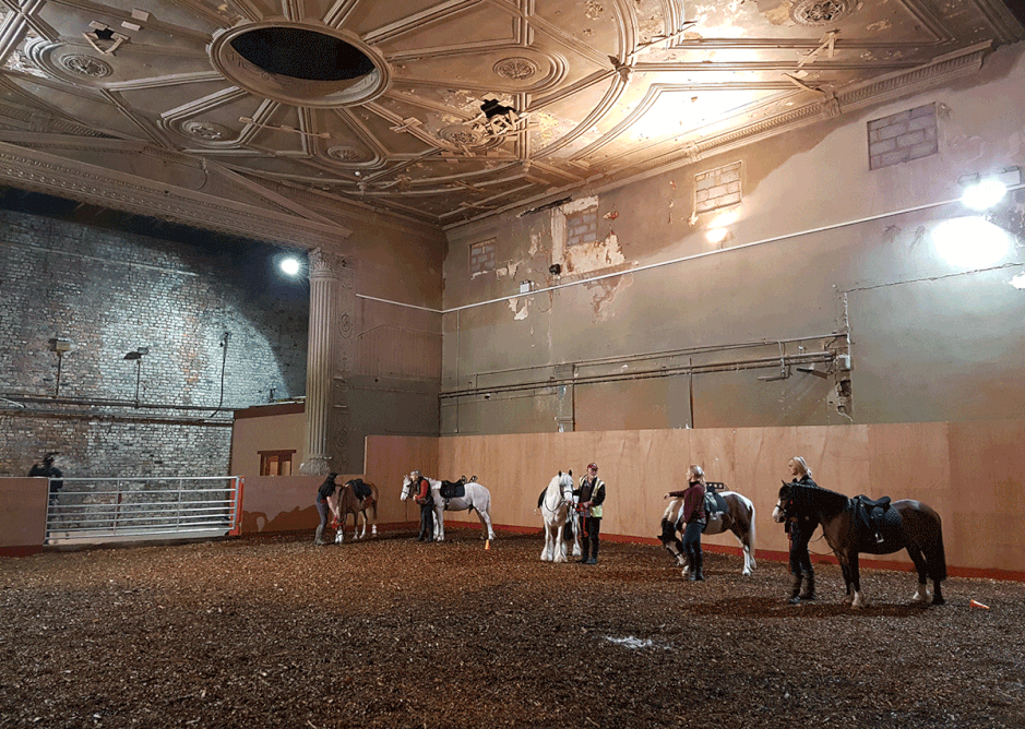 Enlightened reuse - a kids riding school in a derelict music hall in Dingle.