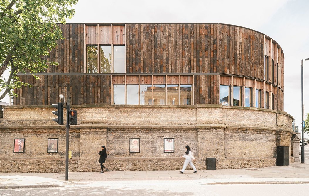 Reclaimed timber sleepers on the facade of Roundhouse Works in Camden, designed by Reed Watts Architects with Paddy Dillon Architect.