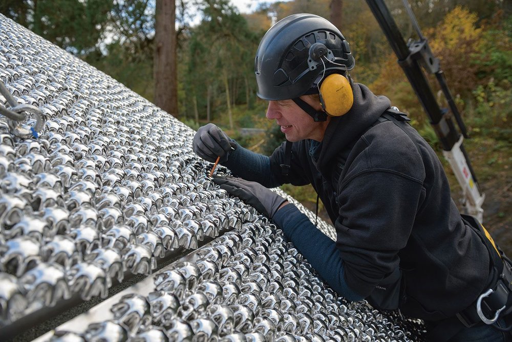 Fixing each stainless steel barnacle to create the skin required five individual welds.