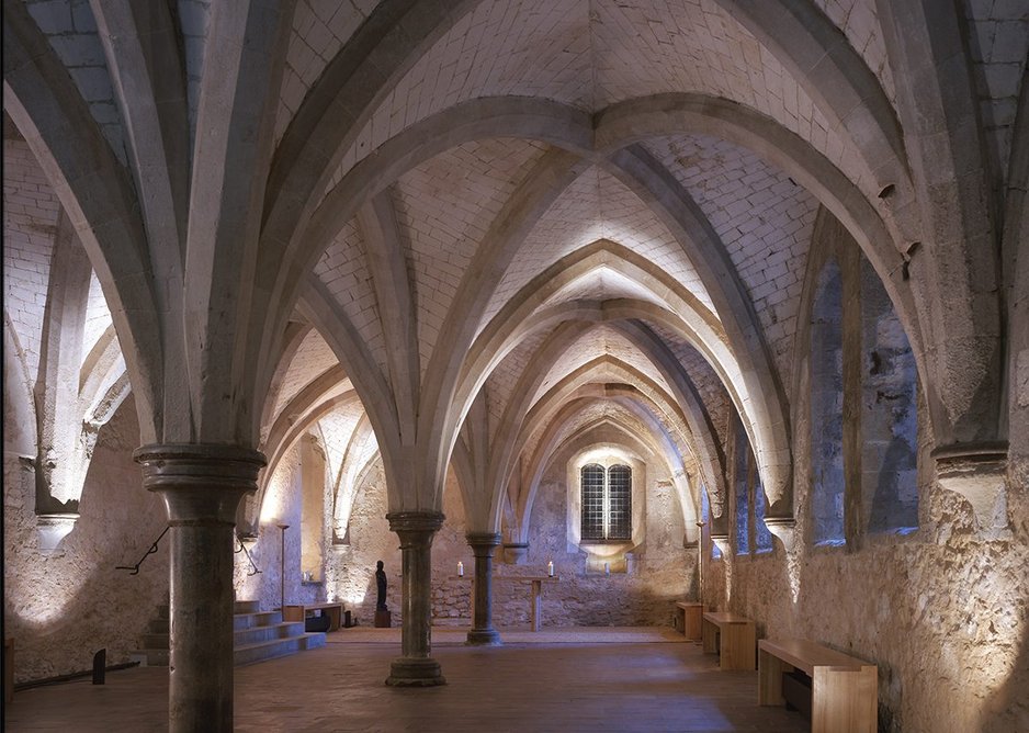 Minimal interventions at Lambeth Palace Crypt chapel with heating integrated into benches.