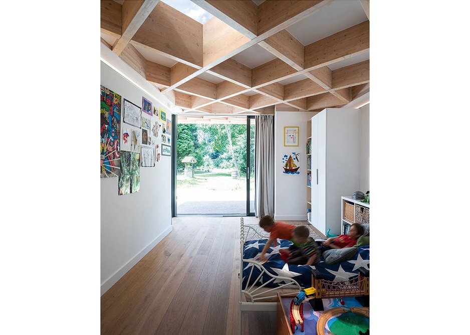 A wide accessible rear entrance gives direct access from the children’s rooms to the covered play spaces and garden.
