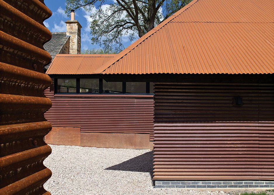 By contrast the south elevation looking back to Winterson’s cottage is less open, using the industrial aesthetic to full effect.