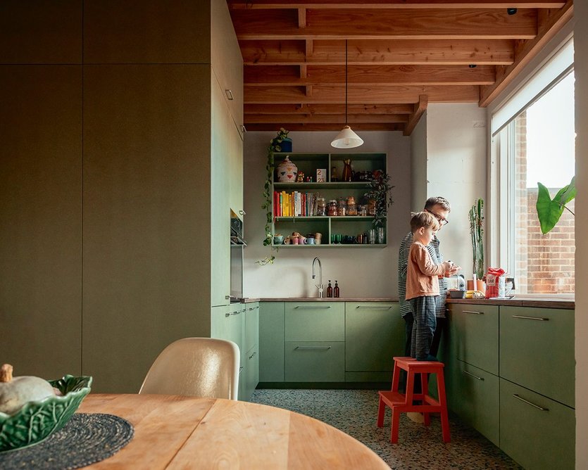 The green kitchen joinery is in standardcolour water-resistant mdf, sealed.