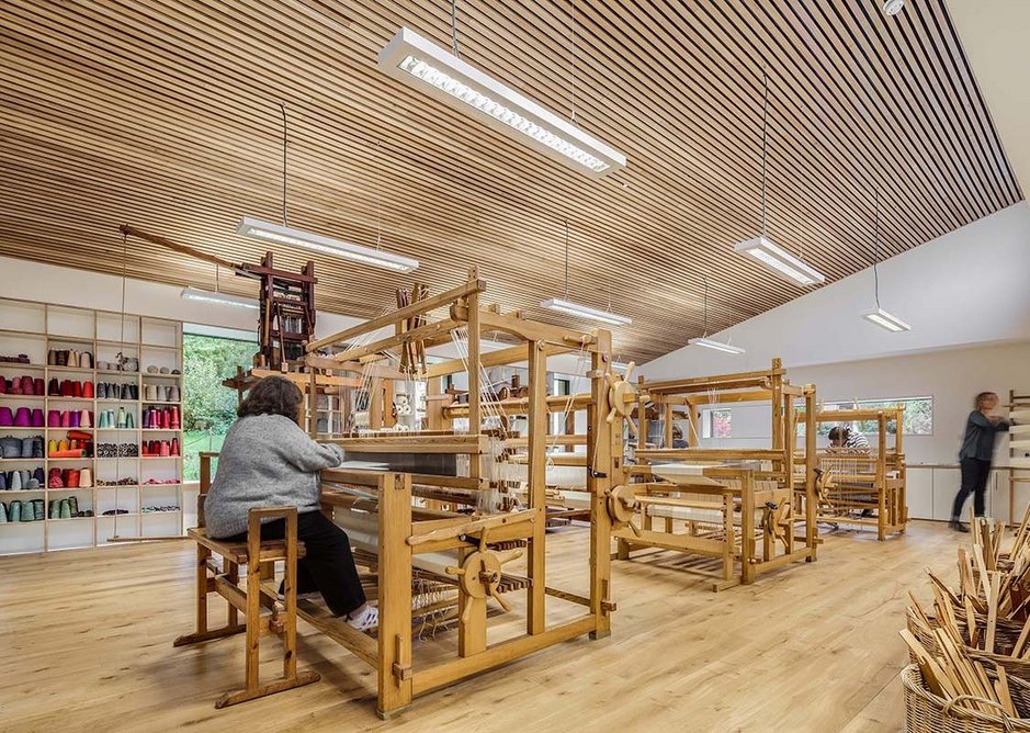 Concentrated meaningful work in this warmly timbered weaving workshop.