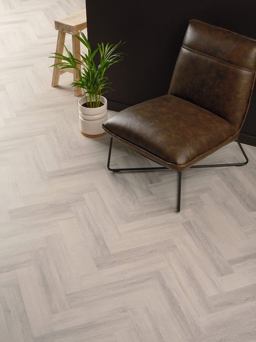 Iced Oak SS5W3310 luxury vinyl tiles in Parquet laying pattern, Spacia Woods range, Amtico.