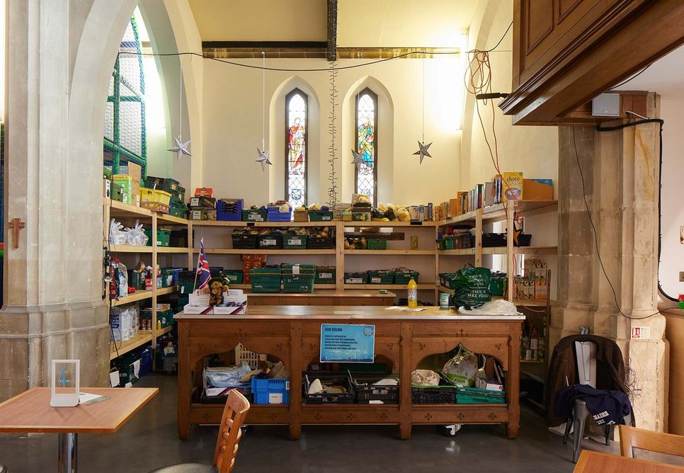 The well-used food bank repurposes former communion tables from side chapels.