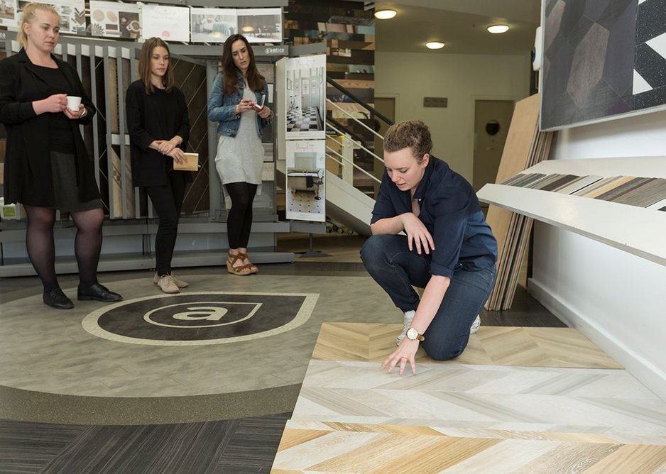 Amtico senior designer Sarah Escott explains the variety of laying patterns and product designs that the participants can work with.