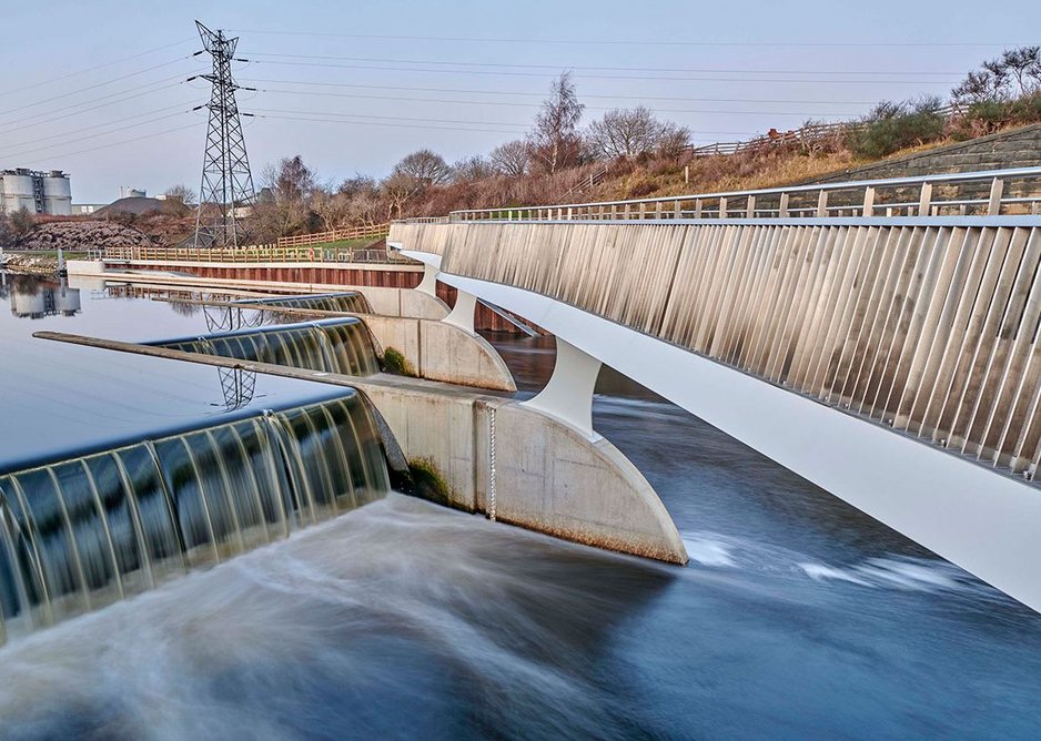 The bridge perches lightly on the abutments of the moveable weirs.