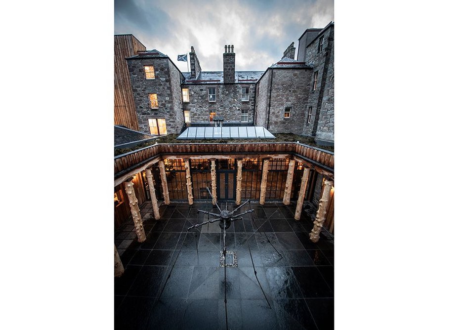 Fife Arms courtyard. A new, rational extension to the hotel, with Louise Bourgeois spider.