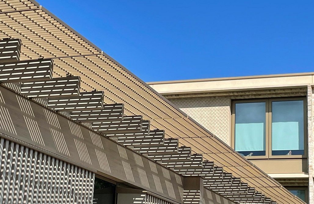 Brise soleil references the latticed oak ceiling of the pavilion interior.