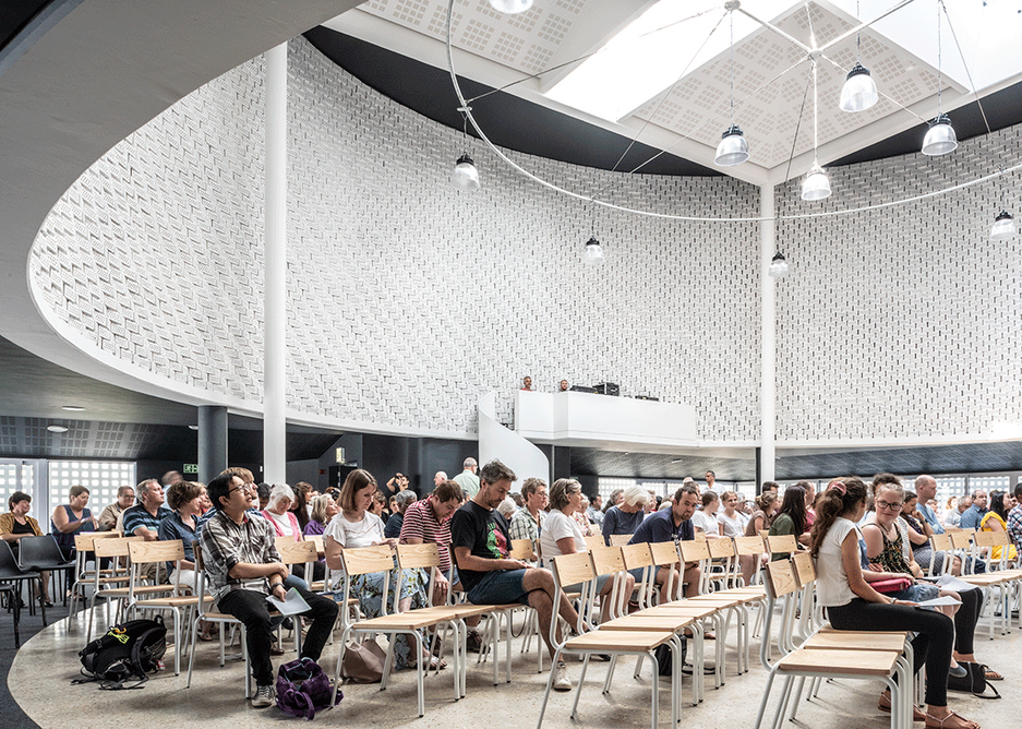 During a service, the angled bricks helping with acoustics.