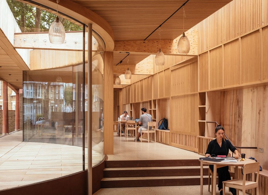 Lea Bridge Library Pavilion and Garden, London, by Studio Weave: The building steps over tree roots at one end, naturally separating the linear space.