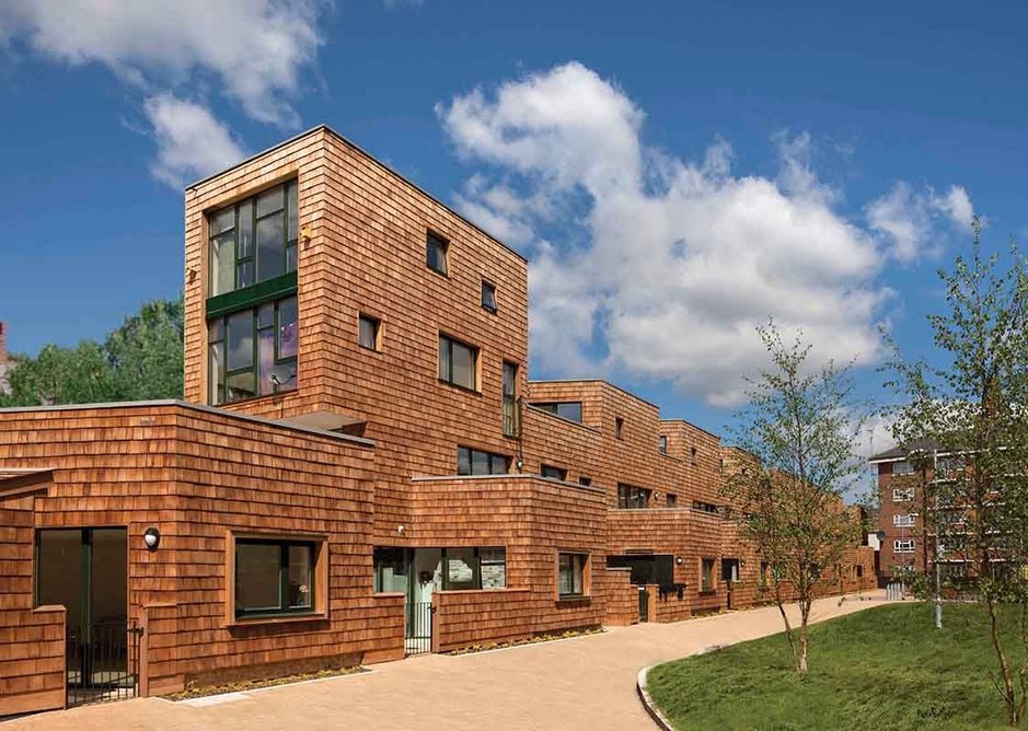 Shingle-clad Hannibal Road social housing terrace, Stepney.