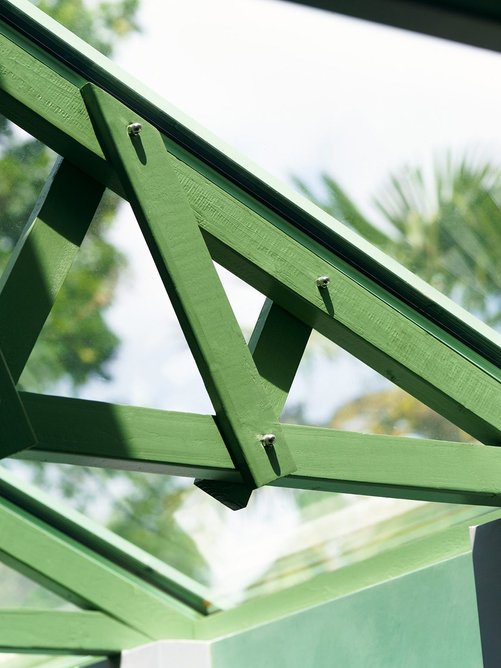 Bolted trusses support a roof light.