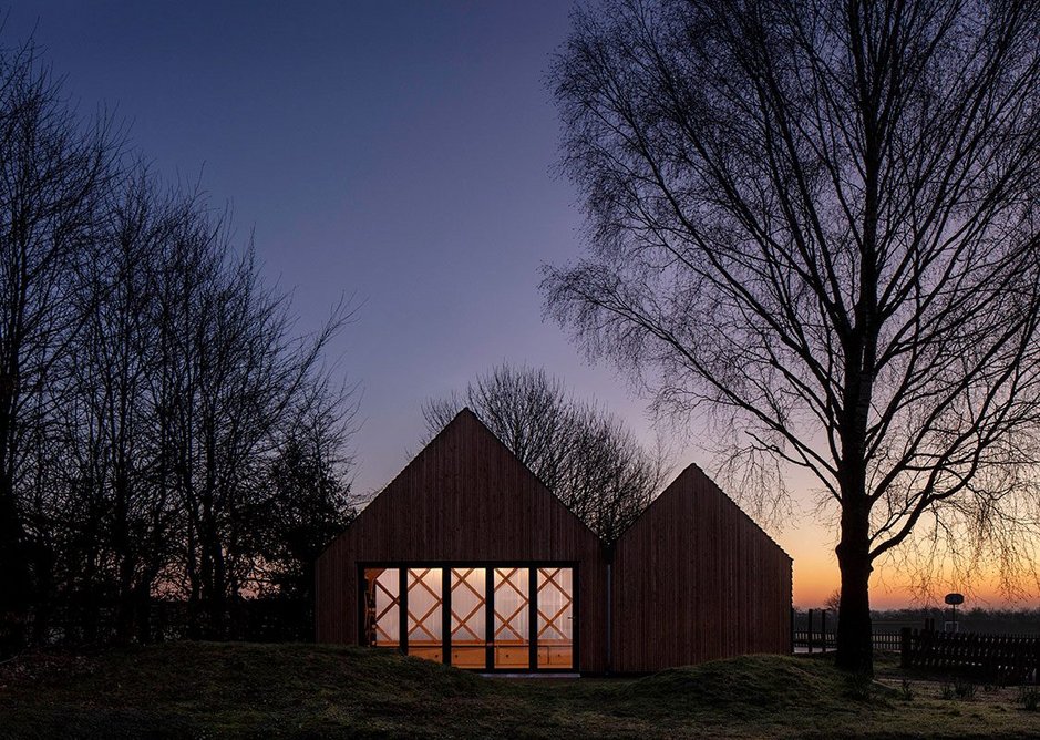 Dusk view of St. John's School Music Pavilion at Lacey Green, Buckinghamshire. Clementine Blakemore initiated the five year project while a student at the Royal College of Art.