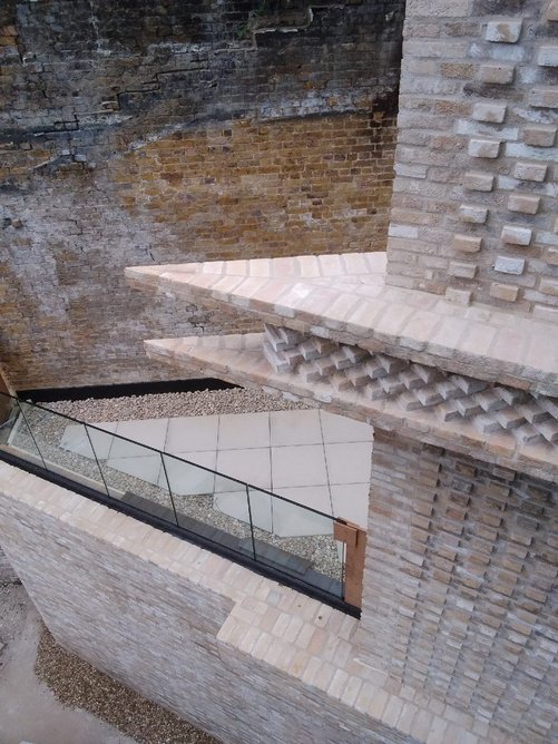 Spearheads feature at four levels of Building 2: BOSS+ bolted to masonry support system.