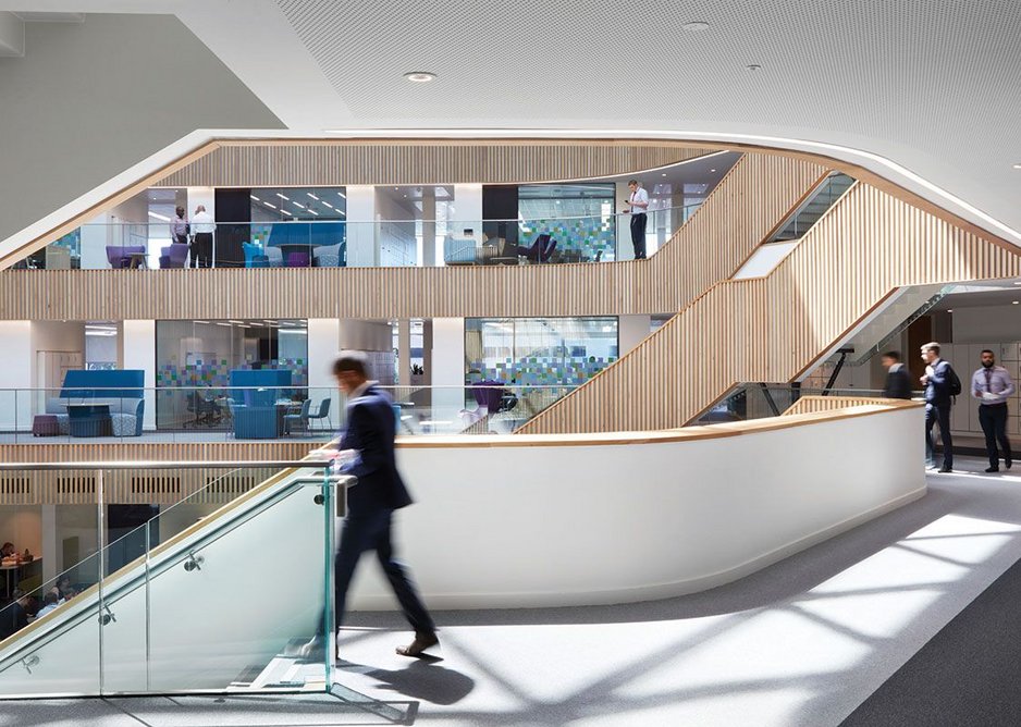 At leaving time the atrium buzzes with conversation as the staff flow down the stairs.