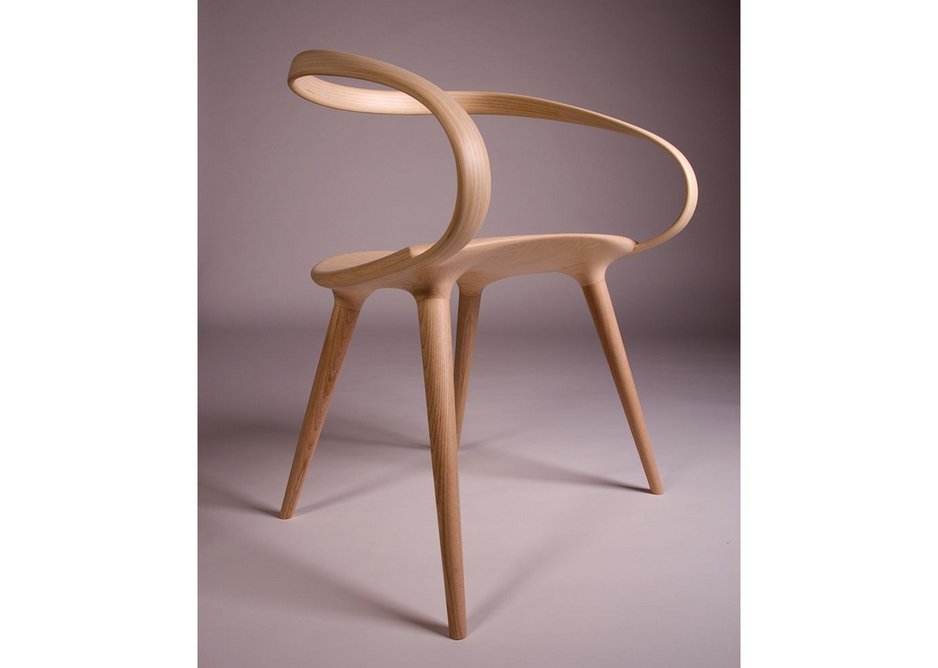 Student designer - Jan Waterston of Rycotewood Furniture Centre made this wraparound bicycle-inspired chair in English Ash and American Ash veneer.