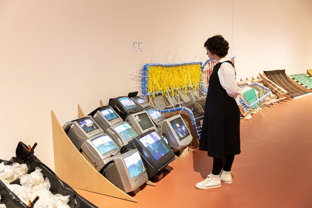 A bank of monitors within the installation of RESOLVE Collective’s them’s the breaks at The Curve at London’s Barbican.