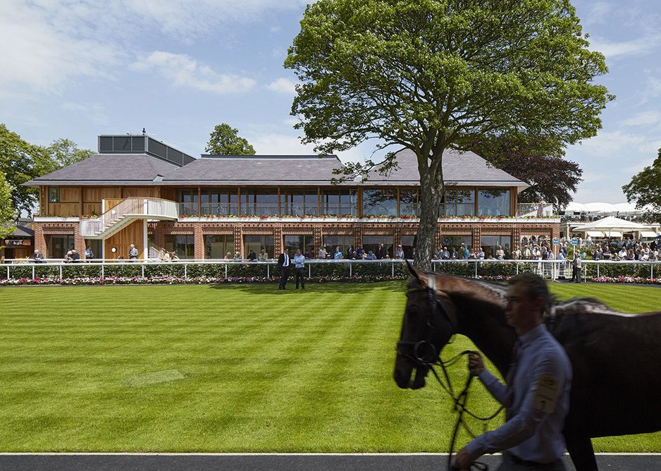 View of the weigh-in building with pre-parade ring in the foreground.