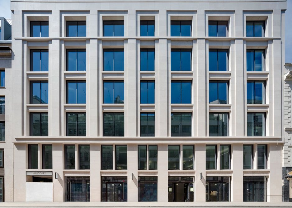 On Moorgate the facade is in fine-grained Portuguese limestone.  New Nun Court alley emerges on the left.