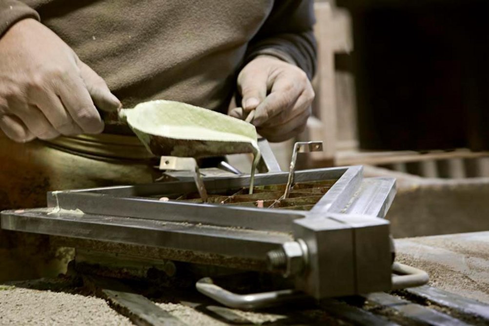 Pouring the tiles in the Mosaics Martí workshop in Barcelona.