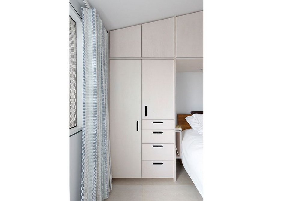 The bedrooms are functionally arranged to maximise storage space.