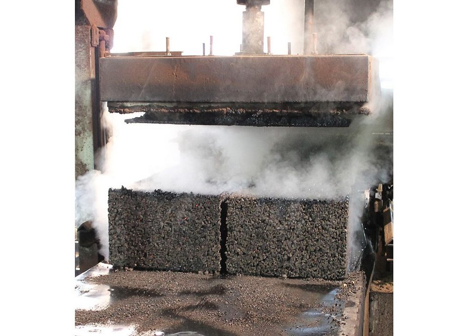 A freshly cooked expanded cork block emerging from the autoclave at Amorim Islamentos, Vendas Novas, Portugal.