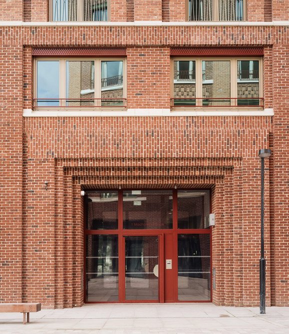 Stepped brickwork frames the entrances.