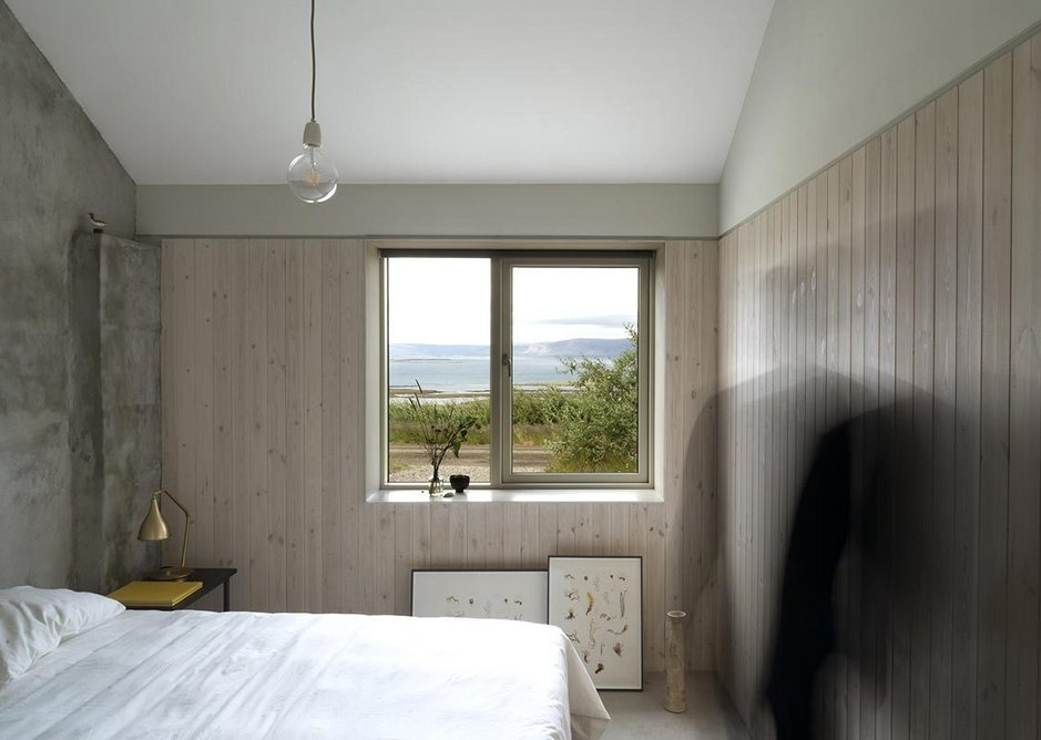 Guest bedroom with the little bird above the bed.