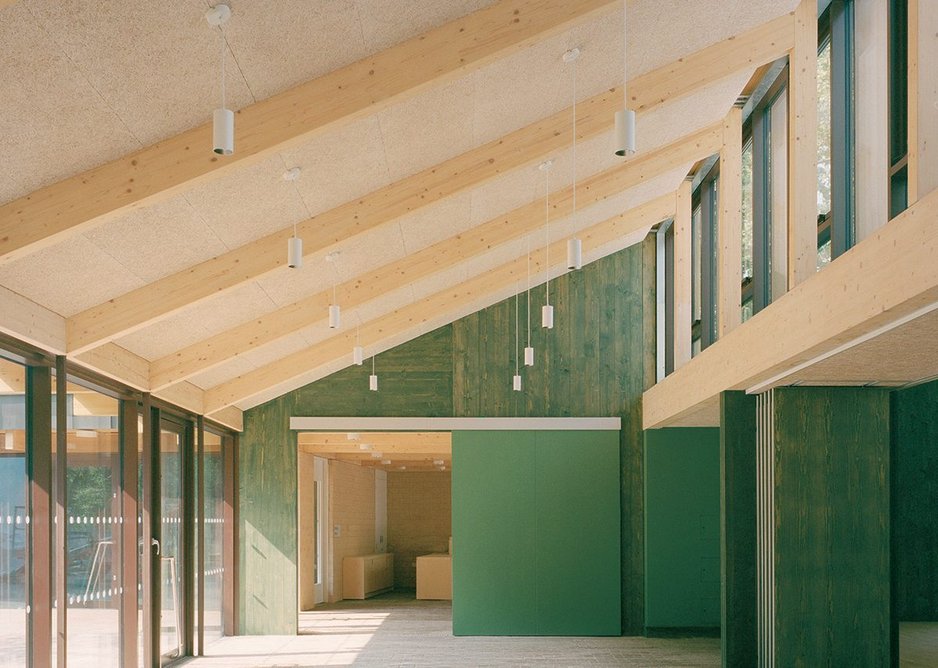 The café looking west to main reception, with main hall to the right. Partitions and sliding doors make the space flexible.