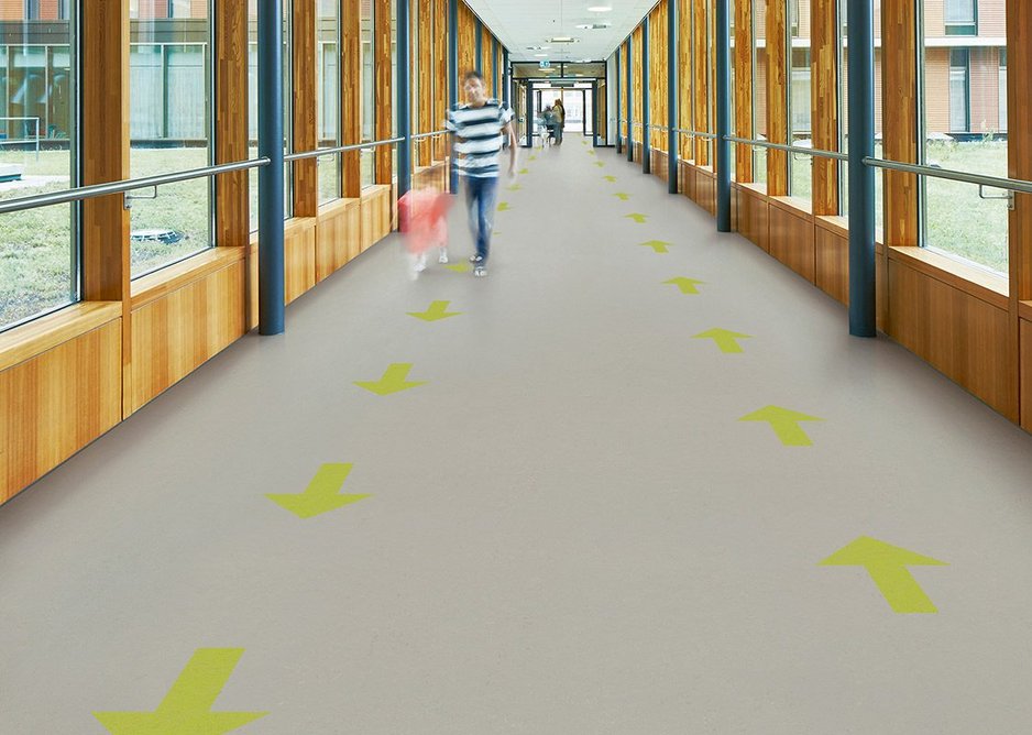 Marmoleum sheet flooring with solid arrows: Forbo can also supply loose arrows to be cut into existing resilient installations.