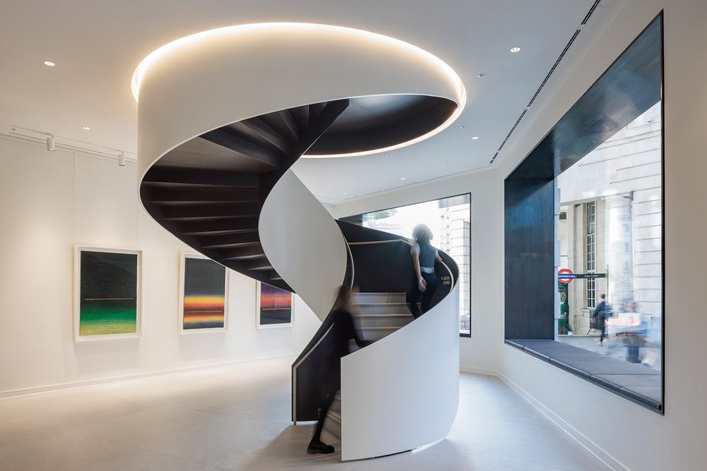 Sculptural staircase to the first floor lounge and bar in Lucent’s office entrance.