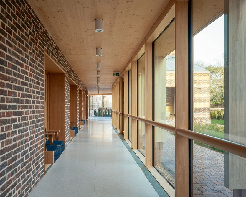 The cloister corridor, with views to the garden, off ers ample opportunity to sit and linger.