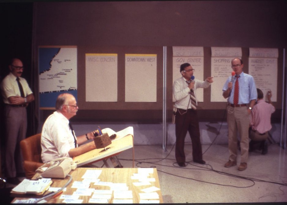 Charles Moore drafting live during a broadcast of Roanoke Design ’79, while host Ted Powers and architect Chad Floyd address the camera, 1979.