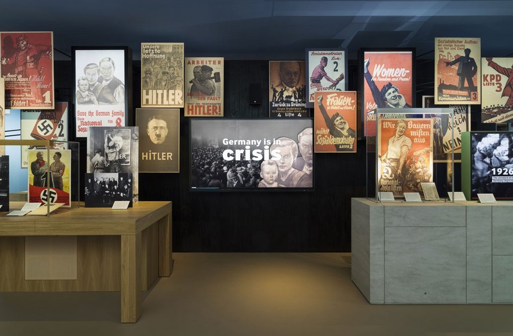 Propaganda charts the rise of the National Socialist power in The Holocaust Galleries, designed by Casson Mann at the IWM London.