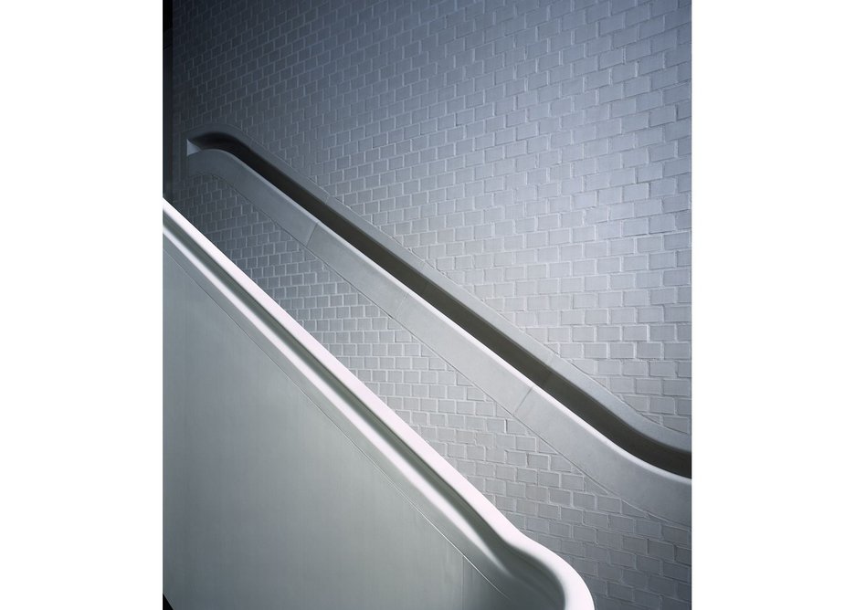 The recessed smooth concrete handrail is exquisite but tests the brick walls and its builders to the extreme.