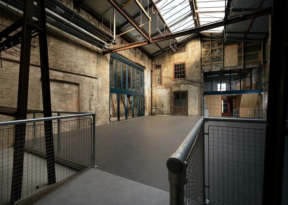 Pritchard Architecture inserted a new floor into the warehouse space to enable new community uses at Treadgold.