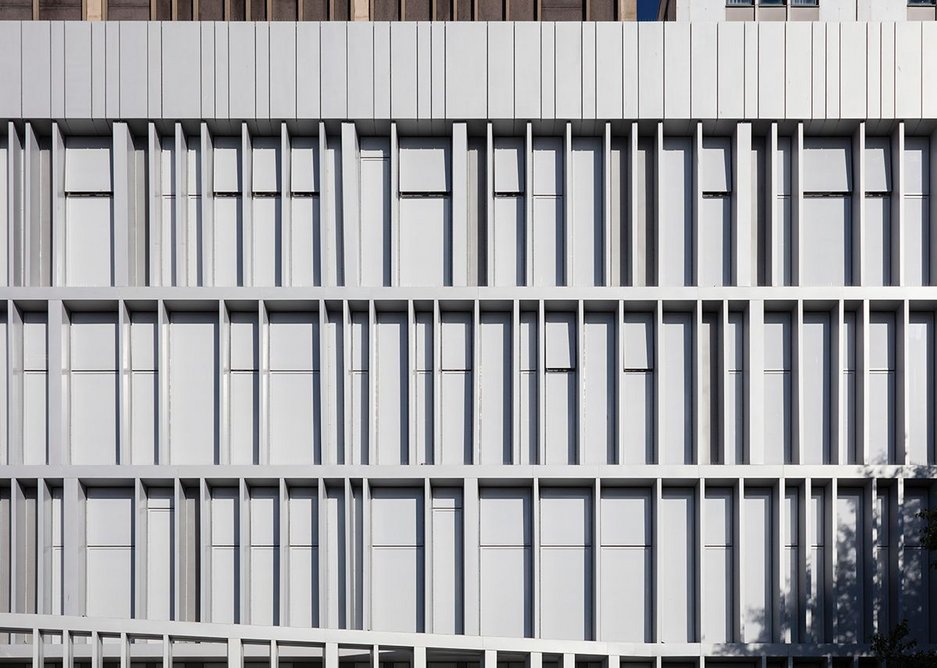 Panels and windows are covered with a micro-perforated film to merge them into one.