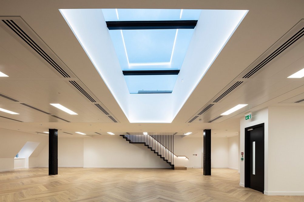 The Flushglaze Walk-on Rooflight feeds daylight from the roof terrace to the floor below.