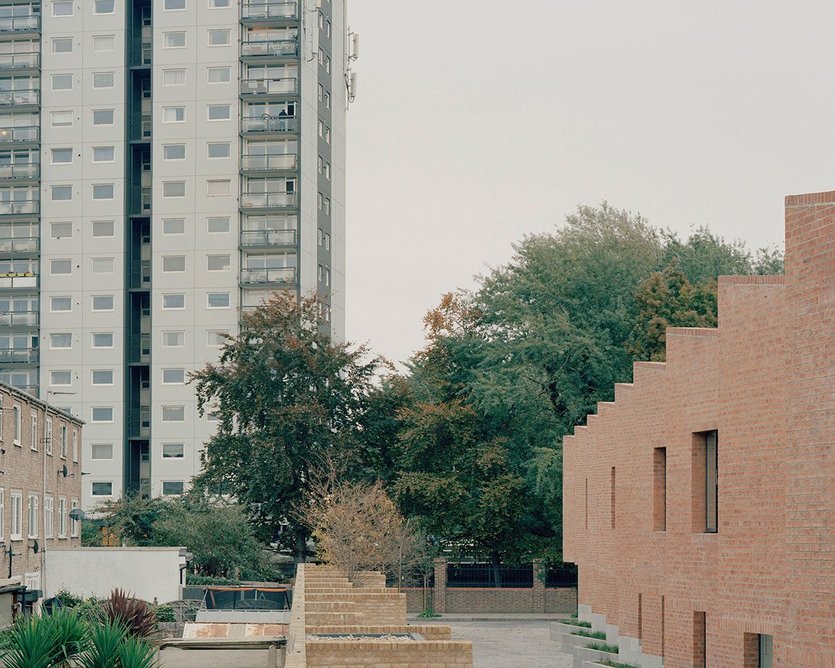 A taller housing tower is opposite the project.