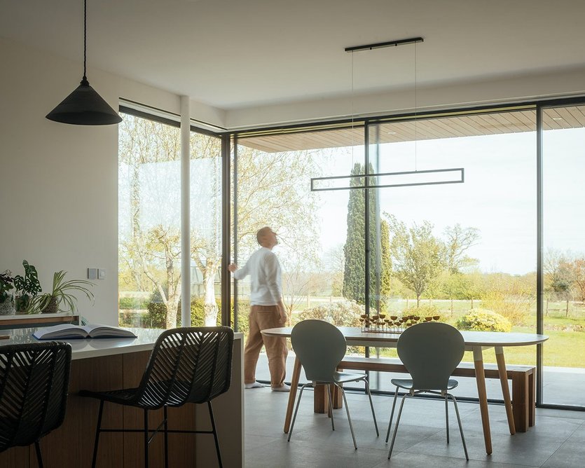 Large sliding doors open onto the garden.