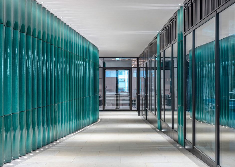 The new Nun Court alley runs from one street to the other and features a sinusoidal glazed ceramic wall.