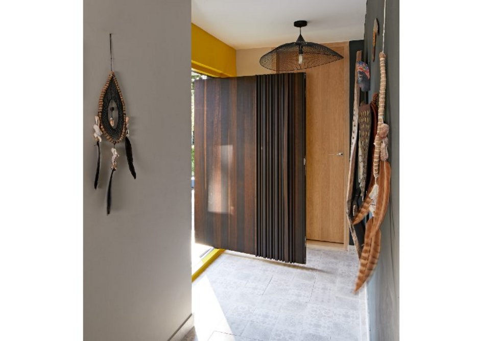Urban Front Bari e80 pivot oversized doorset in Fumed Oak with concealed handle and matching sidelight.
