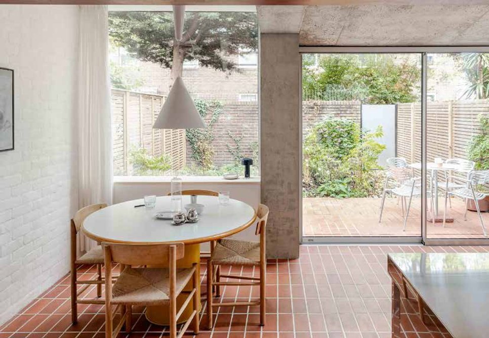 The extended kitchen accommodates a new dining area.