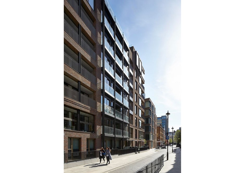Facing north along Riding House St with education room at lower ground for the school opposite.